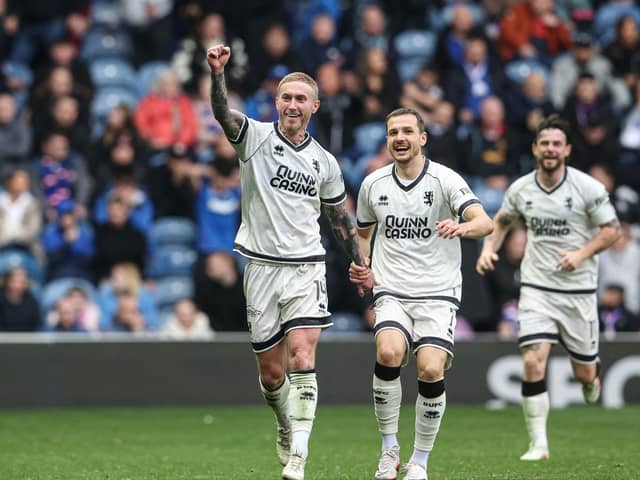 Dundee United's Craig Sibbald celebrates his goal to make it 2-1 to his side in front of dismayed Rangers supporters  (Photo by Alan Harvey / SNS Group)