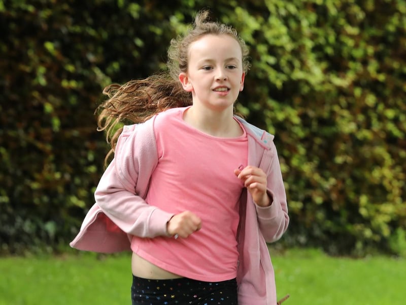 A young runner makes her way around the course. Picture: Sam Stephenson