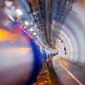 Some of the dipole magnets that bend the path of accelerated protons at the Large Hadron Collider (LHC) in a tunnel of the European Organisation for Nuclear Research (Cern (Picture: Valentin Flauraud/AFP via Getty Images)