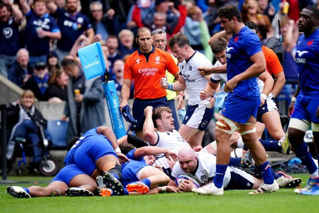 Dave Cherry scores the winning try for Scotland at Murrayfield against France.