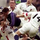 Alan Tait of Scotland forces his way over to score against England in the Calcutta Cup Five Nations match at Twickenham in 1999.