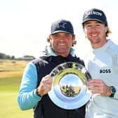 Sean Crocker and his Scottish caddie Steve Pettit with the Hero Open trophy after the American's win at Fairmont St Andrews. Picture: Ross Kinnaird/Getty Images.