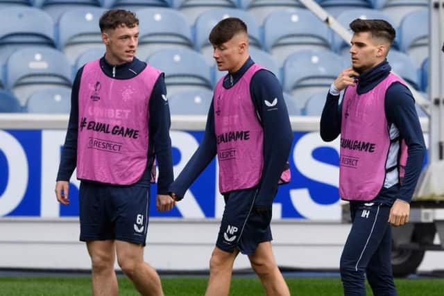 Rangers defender Leon King (left) training alongside Nathan Patterson and Ianis Hagi (right) ahead of a Europa League tie last season. King made two substitute appearances for Steven Gerrard's team during the 2020-21 campaign. (Photo by Alan Harvey / SNS Group)