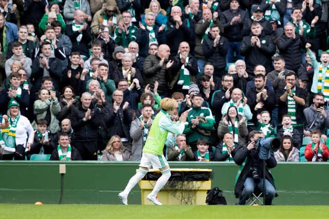 Celtic's Kyogo Furuhashi applauds the fans as he warms up in the first half against St Johnstone. (Photo by Craig Williamson / SNS Group)