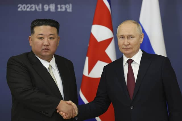 Russian president Vladimir Putin (right) and North Korea's leader Kim Jong-Un shake hands during their meeting at the Vostochny cosmodrome outside the city of Tsiolkovsky. Picture: Vladimir Smirnov, Sputnik, Kremlin Pool Photo via AP