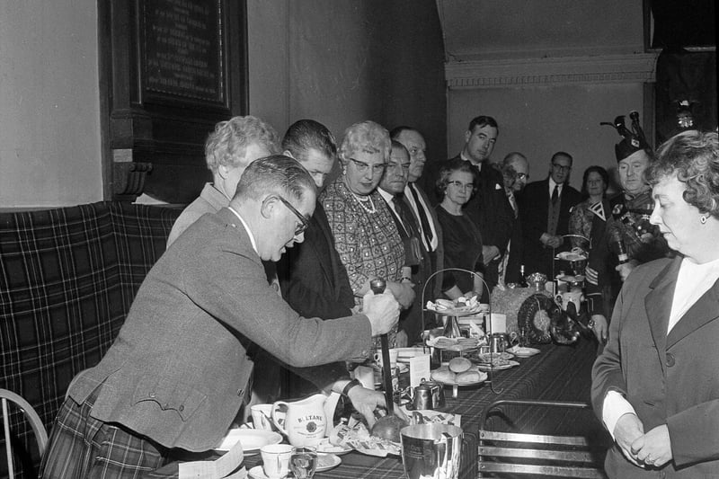 Cutting the haggis at the 7/9th Royal Scots Association Burns Supper in 1963.