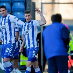 Oli Shaw celebrates making it 2-1 with teammate Kyle Lafferty. (Photo by Sammy Turner / SNS Group)