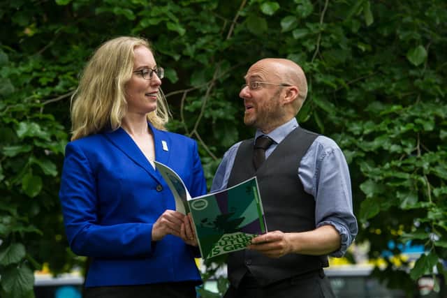 Scottish Greens co-convener Patrick Harvie at the Glad Cafe in Glasgow with fellow party co-convener Lorna Slater. Picture: John Devlin