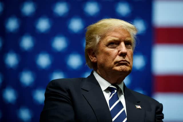 Donald Trump continues to deny he lost the US election (Picture: Drew Angerer/Getty Images)