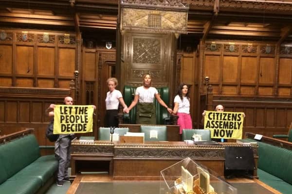 The picture tweeted by Extinction Rebellion showing protesters in the Commons Chamber. Picture: Twitter