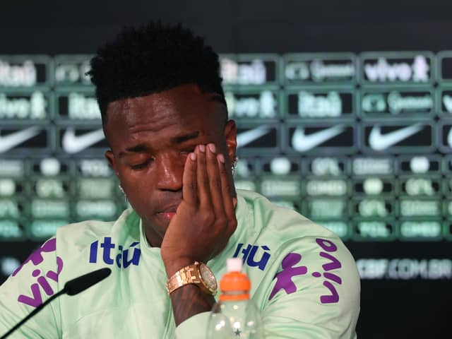 Brazil's forward Vinicius Junior cries as he gives a press conference on the eve of the international friendly football match between Spain and Brazil.