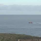 The lifeboat searched the coast before standing down.