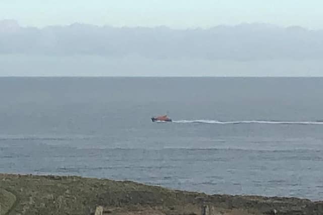 The lifeboat searched the coast before standing down.