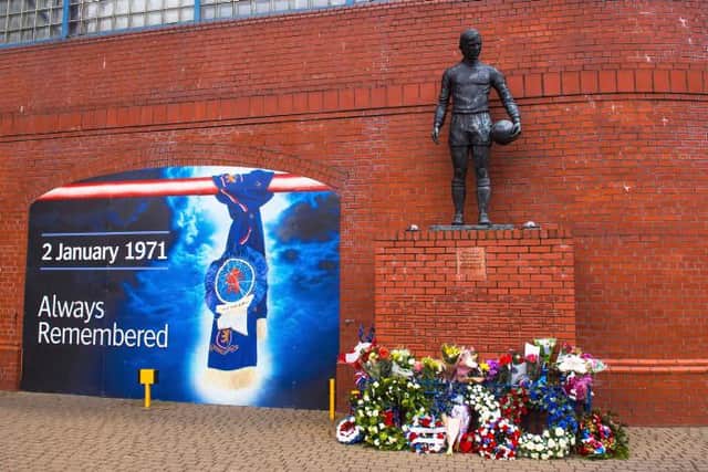 The statue of John Greig at the memorial outside Ibrox Stadium to the 66 supporters who lost their lives in the disaster on January 2, 1971. Picture: Gary Hutchison, SNS Group