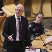 Deputy First Minister John Swinney updates MSPs on any changes to the Covid-19 restrictions in the debating chamber of the Scottish Parliament in Edinburgh. Picture date: Tuesday November 9, 2021.