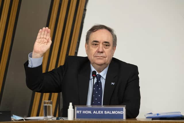 Former first minister Alex Salmond is sworn in before giving evidence to a Scottish Parliament Harassment committee