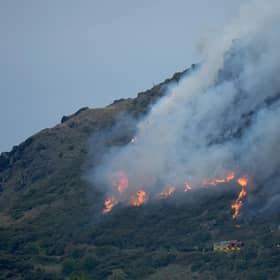 Firefighters at the scene of the Arthur's Seat blaze on Sunday, August 11. (Picture: Peter Summers/Getty Images)