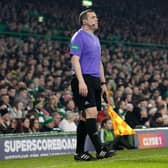 Scottish Conservatives leader Douglas Ross was targeted by a banner from Celtic fans while performing assistant referee duties during the Scottish Cup tie against St Mirren on Saturday. (Photo by Alan Harvey / SNS Group)