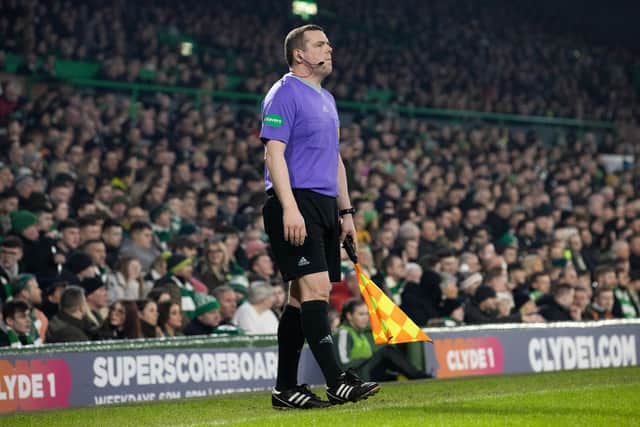 Scottish Conservatives leader Douglas Ross was targeted by a banner from Celtic fans while performing assistant referee duties during the Scottish Cup tie against St Mirren on Saturday. (Photo by Alan Harvey / SNS Group)