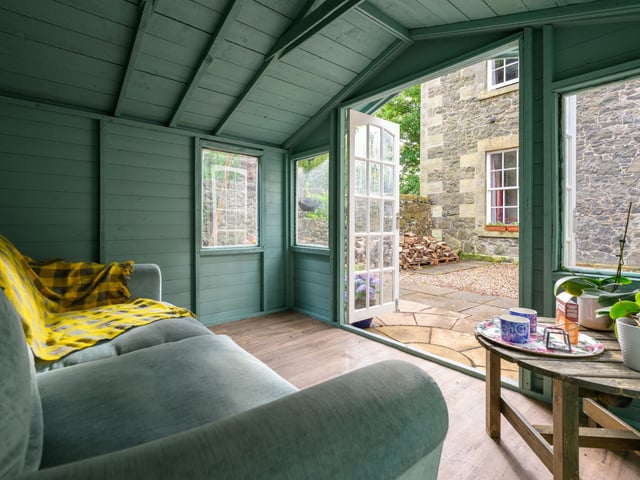 Ingothill House stands in an extensive garden with a large lawn and a range of mature plants, trees and shrubs. To the rear of the house is a courtyard area with a wooden summer house.