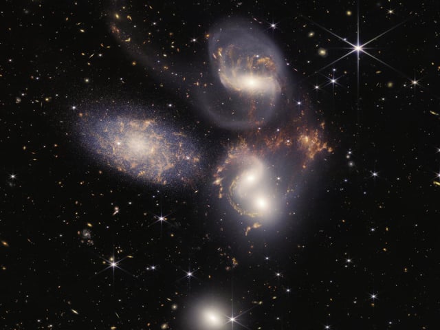 Another look at Stephan's Quintet captured by the James Webb Space Telescope. This image shows in rare detail how interacting galaxies trigger star formation in each other and how gas in galaxies is being disturbed. It also shows outflows driven by a black hole in Stephan’s Quintet in a level of detail never seen before.