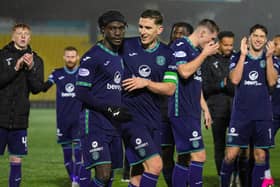 The Hibs players celebrate their 1-0 win over Livingston in West Lothian.