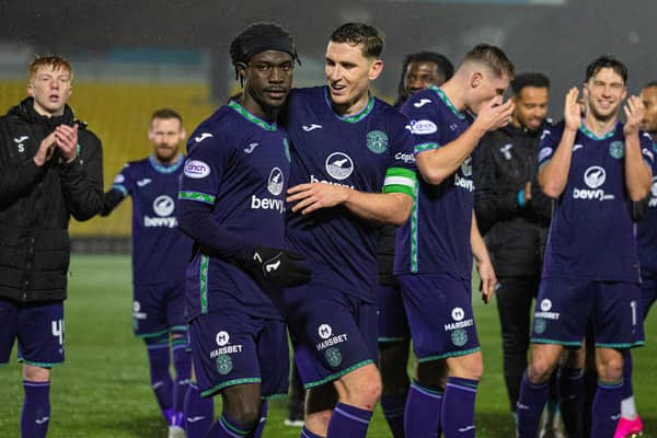 The Hibs players celebrate their 1-0 win over Livingston in West Lothian.