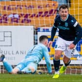 Danny Mullen celebrates after scoring Dundee's second goal in the 3-0 win over Motherwell (Photo by Craig Foy / SNS Group)