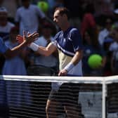 Andy Murray shakes hands with Francisco Cerundolo after winning the first round men's singles match at the US Open. (Photo by Julian Finney/Getty Images)