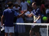 Andy Murray shakes hands with Francisco Cerundolo after winning the first round men's singles match at the US Open. (Photo by Julian Finney/Getty Images)