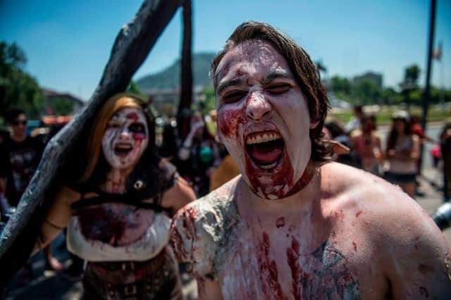 Zombie nation. (Photo by Martin BERNETTI / AFP) (Photo by MARTIN BERNETTI/AFP via Getty Images)