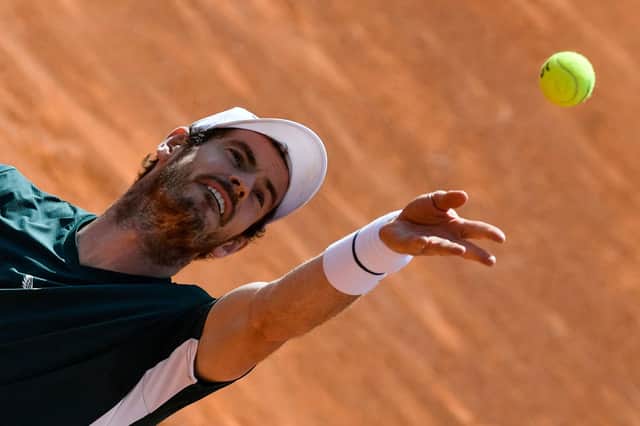 Andy Murray serves during his doubles match with Liam Broady against Germany's Kevin Krawitz and Romania's Horia Tecau in Rome. Picture: AFP via Getty Images