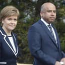 First Minister Nicola Sturgeon with Sanjeev Gupta, the head of the Liberty Group, ahead of a ceremony where Tata Steel handed over the keys of two Lanarkshire steel plants to metals firm Liberty House, at Dalzell steelworks in Scotland.