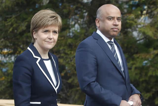 First Minister Nicola Sturgeon with Sanjeev Gupta, the head of the Liberty Group, ahead of a ceremony where Tata Steel handed over the keys of two Lanarkshire steel plants to metals firm Liberty House, at Dalzell steelworks in Scotland.