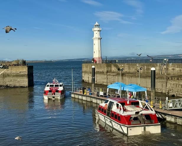 Passengers from a Norwegian Cruise Line ship tender into Newhaven Harbour, ready to spend cash in Edinburgh and environs