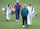 Bob MacIntyre walks ahead of Lee Westwood during the third round of The Masters at Augusta National Golf Club. Picture: Andrew Redington/Getty Images.