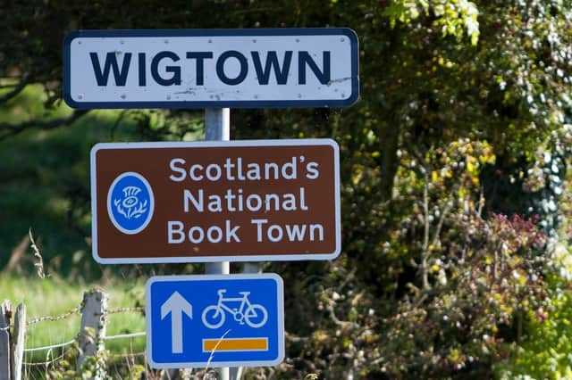 Signs that highlight the renown of the Wigtown Book Festival