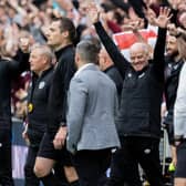 Hearts interim manager Steven Naismith, left, celebrates the 1-1 draw with Hibs.
