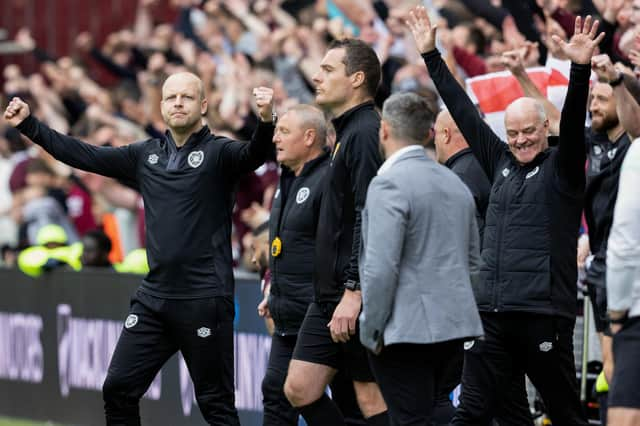 Hearts interim manager Steven Naismith, left, celebrates the 1-1 draw with Hibs.