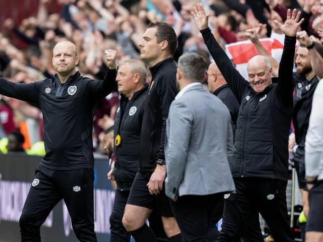 Hearts interim manager Steven Naismith, left, celebrates the 1-1 draw with Hibs.