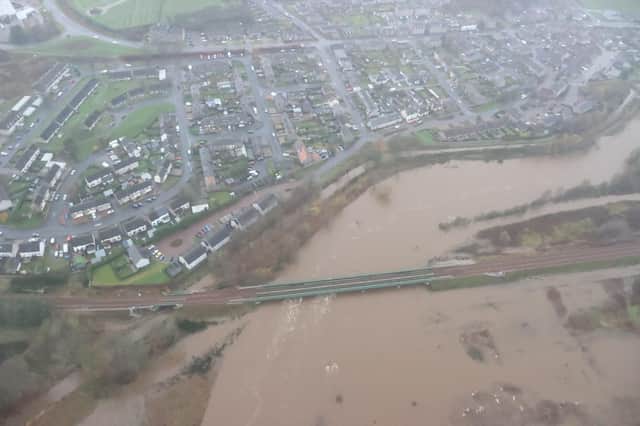 Network Rail: "Here's a birds-eye view from our #AirOps helicopter between Dyce and Kintore on the Aberdeen - Inverness route. "The River Don has burst its banks, though the railway is now open." Picture: Network Rail Twitter