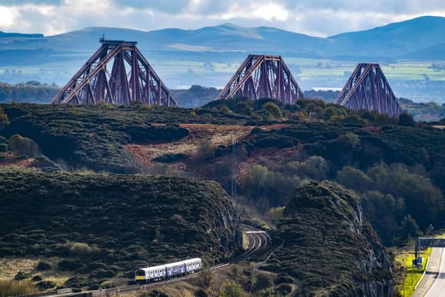 A Vivarail battery train near the Forth Bridge which was demonstrated during the COP26 climate change summit in Glasgow last November. Picture: Network Rail