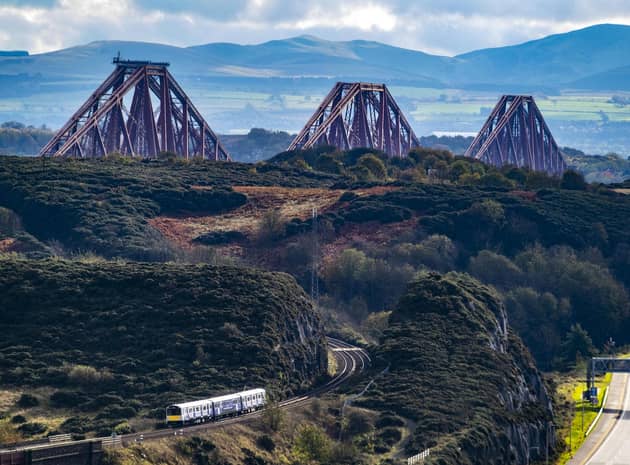 A Vivarail battery train near the Forth Bridge which was demonstrated during the COP26 climate change summit in Glasgow last November. Picture: Network Rail