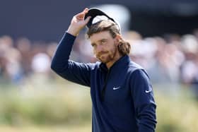 Tommy Fleetwood acknowledges the crowd at the end of his openig round in the 151st Open at Royal Liverpool. Picture: Warren Little/Getty Images.