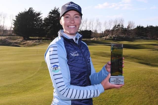 Laura Beveridge shows off the trophy after winning The Rose Ladies Series at Southport and Ainsdale Golf Club last month. Picture: Alex Burstow/Getty Images.