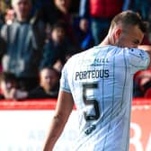 Ryan Porteous leaves the field after being shown a red card in Hibs' 3-1 defeat to Aberdeen at Pittodrie.  (Photo by Craig Foy / SNS Group)