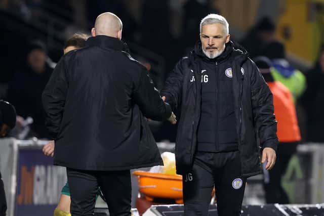 Hibs interim boss David Gray (left) with St Mirren manager Jim Goodwin.
