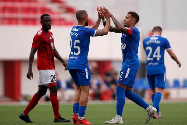 GIBRALTAR, GIBRALTAR - SEPTEMBER 17: James Tavernier of Rangers celebrates with teammates after scoring his team's first goal from a free-kick during the UEFA Europa League second qualifying round match between Lincoln Red Imps and Rangers at Victoria Stadium on September 17, 2020 in Gibraltar, Gibraltar. (Photo by Fran Santiago/Getty Images)