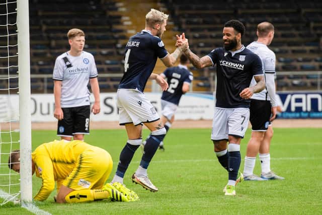 Dundee's Elliot French (C) celebrates making it 4-0 with team-mate Alex Jakubiak during the Premier Sports Cup win over Forfar Athletic at Dens Park. (Photo by Mark Scates / SNS Group)