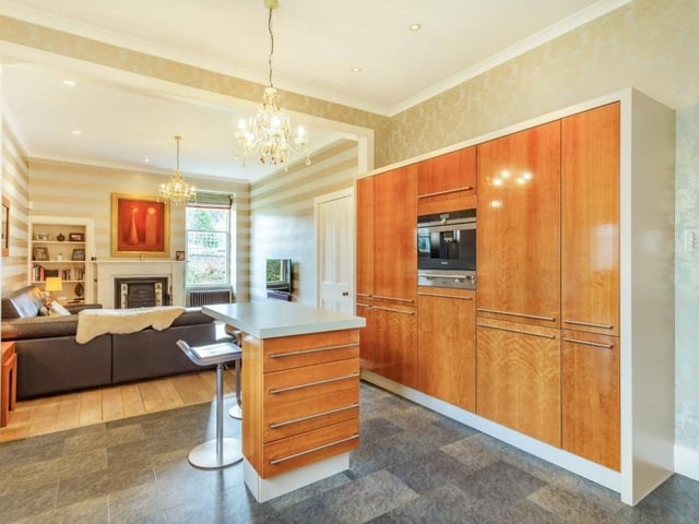 Open plan kitchen and sitting area.
